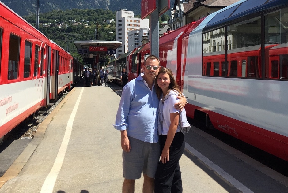 father and daughter train station